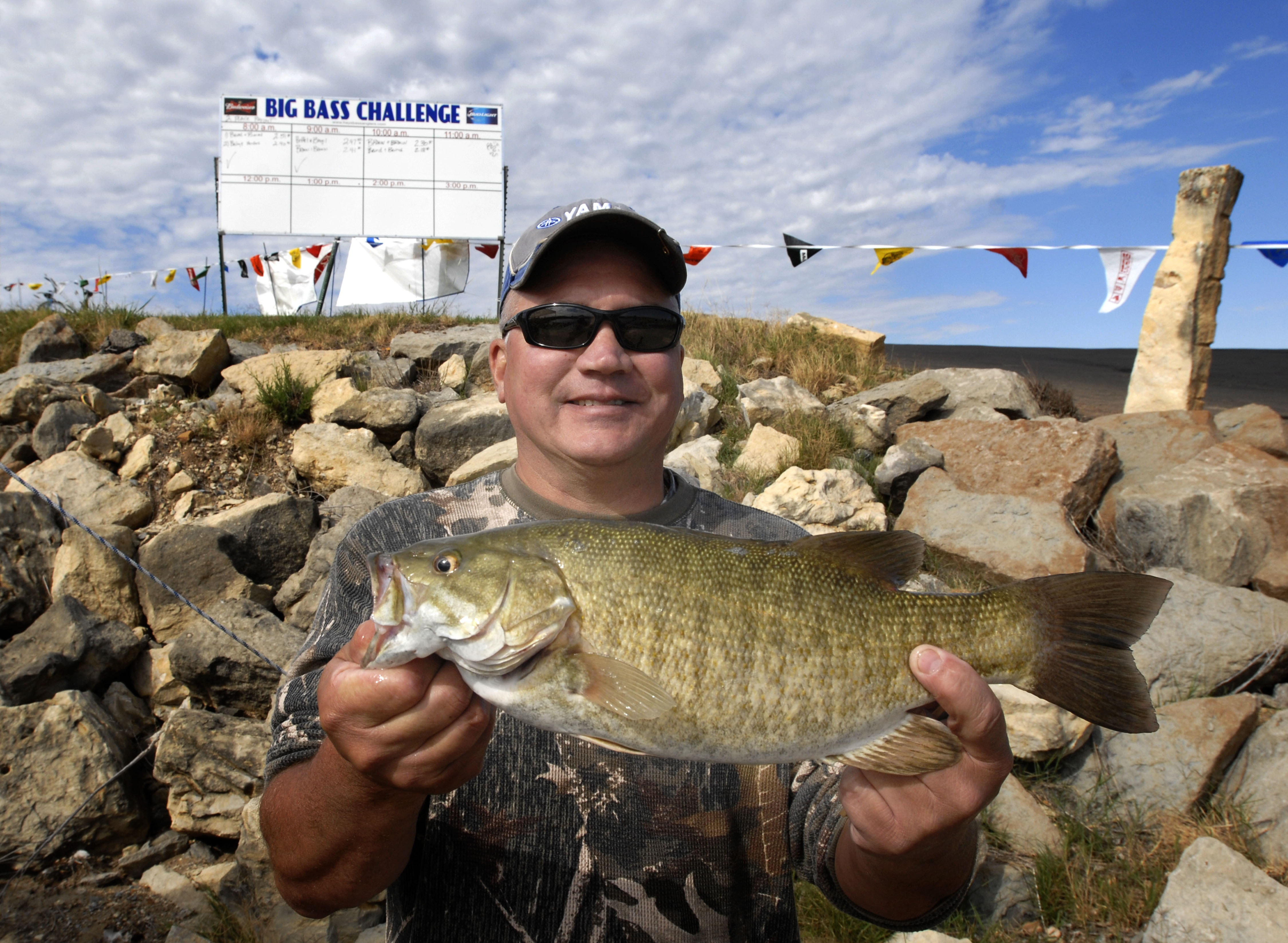 Terry Knueppel of Coweta, Okla., is pictured with his smallmouth bass weighing 2.89 pounds that claimed the top honors at the Hays Bass Anglers Association's Big Bass Challenge on Sept. 19, 2015, at Lake Wilson.